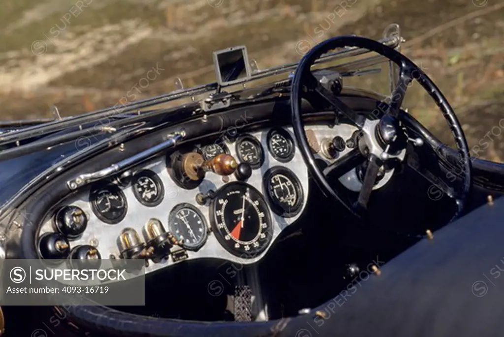 1929 Bentley Birkin Blower S/C Tourer interior cockpit detail. Although W. O. Bentley despised forced induction, his Bentley Boys, and especially Henry Tim Birkin, wanted to supercharge the engine for more power. When the company ran out of money in 1925, millionaire Bentley Boy, Woolf Barnato bought the company, and in 1929 the first supercharged 'Blower' Bentley was built at Sir Henry Birkin's engineering works in Welwyn Garden City. Barnato quickly authorised the building of 50 production Blo