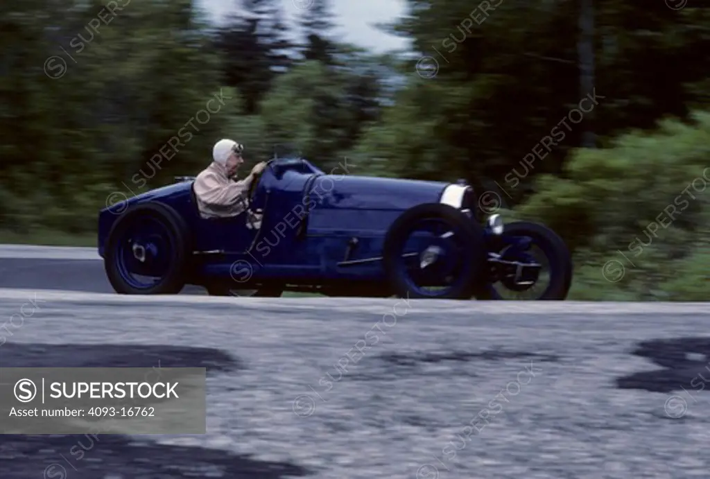 Bugatti Type 37 Rene Dreyfus front 3/4 action. Ren© Dreyfus (born May 6, 1905 - died August 16, 1993) was a French driver who raced automobiles for 14 years in the 1920s and 1930s, the Golden Era of Grand Prix motor racing.  The Type 35 chassis and body were reused on the Type 37 sports car. Fitted with a new 1.5 L (1496 cc/91 in¬) straight-4 engine, 290 Type 37s were built. This engine was an SOHC 3-valve design and produced 60 hp (44 kW). The same engine went on to be used in the Type 40.