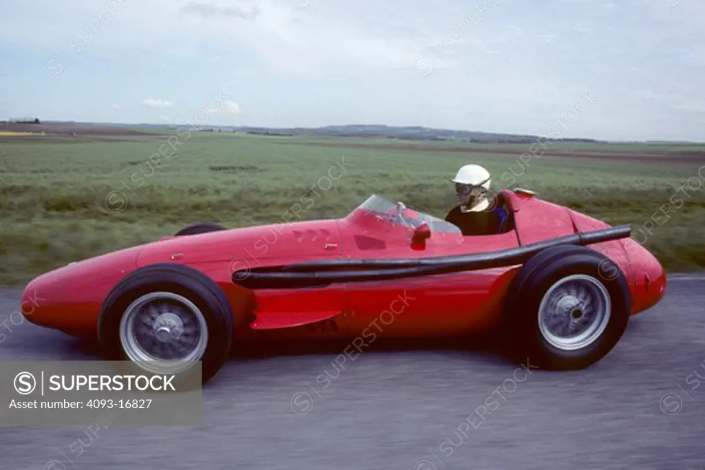 1957 Maserati 250F race car profile action. The Maserati 250F (first raced January 1954 - last raced November 1960) was a racing car made by Maserati of Italy, used in '2.5 litre' Formula One racing (thus, the '250' and 'F'). 26 examples were made in total. It was introduced for the 1954 Formula One season and remained in use by customer teams until 1960.  The Maserati is on the old Reims race track. Between 1925 and 1969, Reims hosted the Grand Prix de la Marne automobile race at a circuit ca