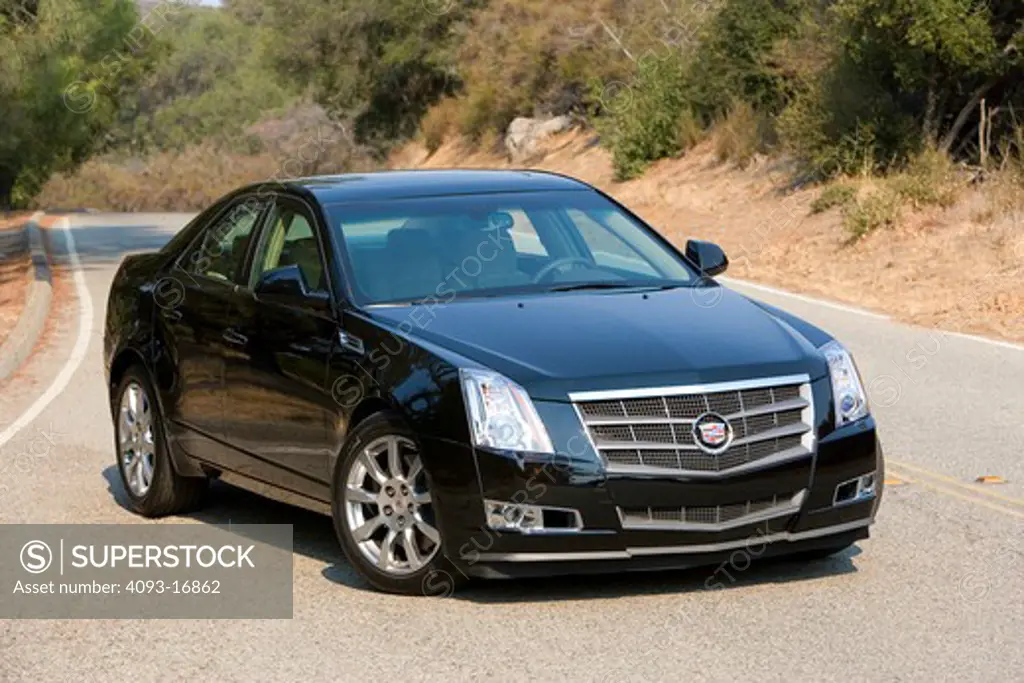2008 Cadillac CTS The CTS is a mid size entry level luxury car made by General Motors for the Cadillac brand.  3.6-liter variable valve timing V6 with 263 hp (196 kW) and 252 ft·lbf (342 N·m) of torque. A second version will be offered, a new 3.6-liter direct-injection V6 VVT engine with 304 horsepower (227 kW) and 270 pound-feet of torque using regular unleaded gas. on an empty road in the hills