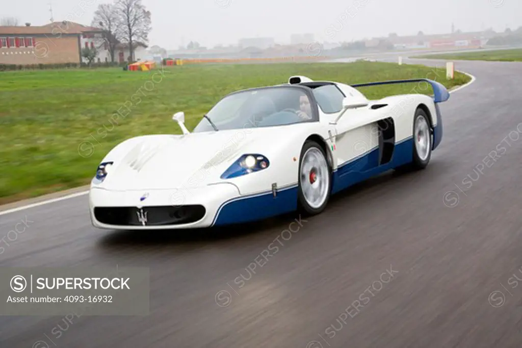 2007 Maserati MC 12 The Maserati MC12 is a grand tourer produced by Maserati to allow a racing variant to compete in the FIA GT Championship.  MC12 is a two-door coupe with a targa top roof on a closed track