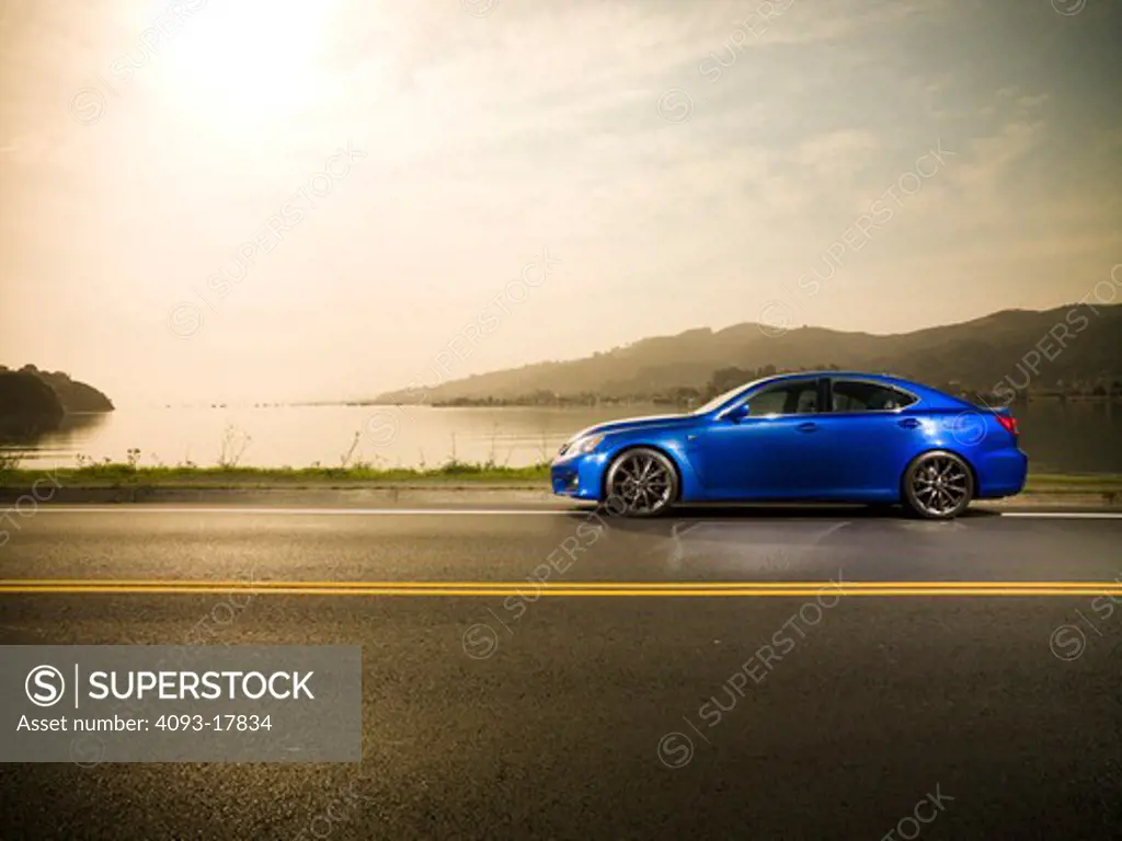 2009 Lexus IS F is-f in a beautiful outdoor scene in the woods with mountains open road empty