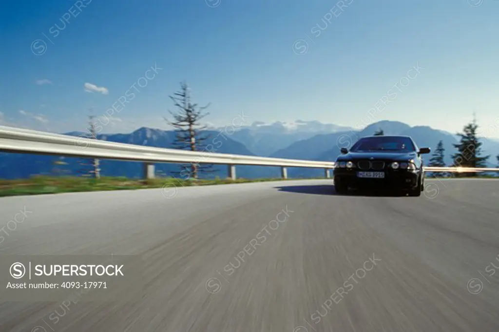 BMW 5 Series 2000 black cornering curve guard rail street