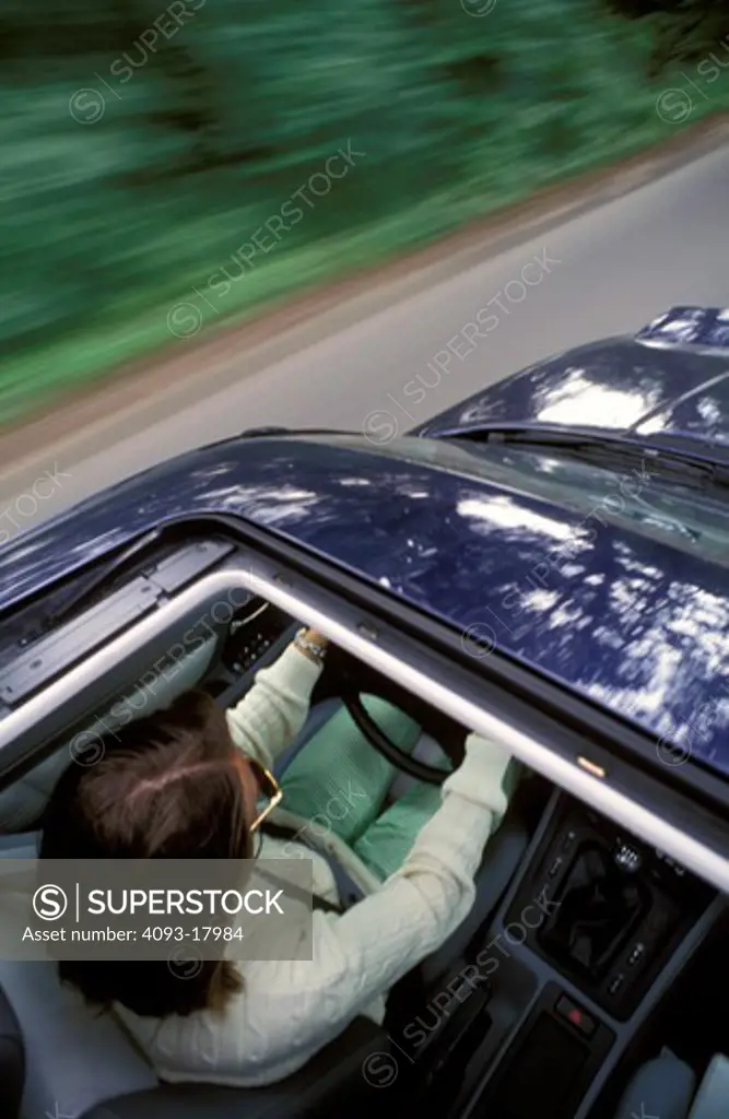 overhead interior BMW 850CSi 8 Series 1996 blue motion sunroof open street