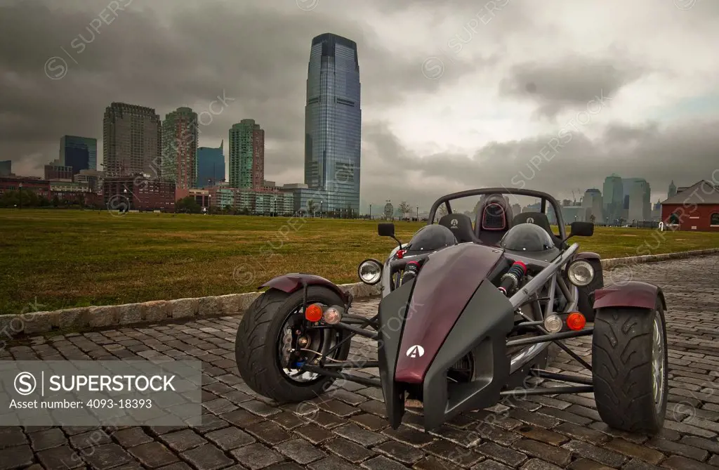 2006 Ariel Atom  The Ariel Atom is a high performance sports car made by the Ariel Motor Company based in Somerset, England and under license also by Brammo Motorsports in the United States. It is unusual in the respect that it is exoskeletal (the chassis is the body), and therefore lacks a roof, windows and other features commonly found on road cars. It is available with a range of engines On the streets in New York City