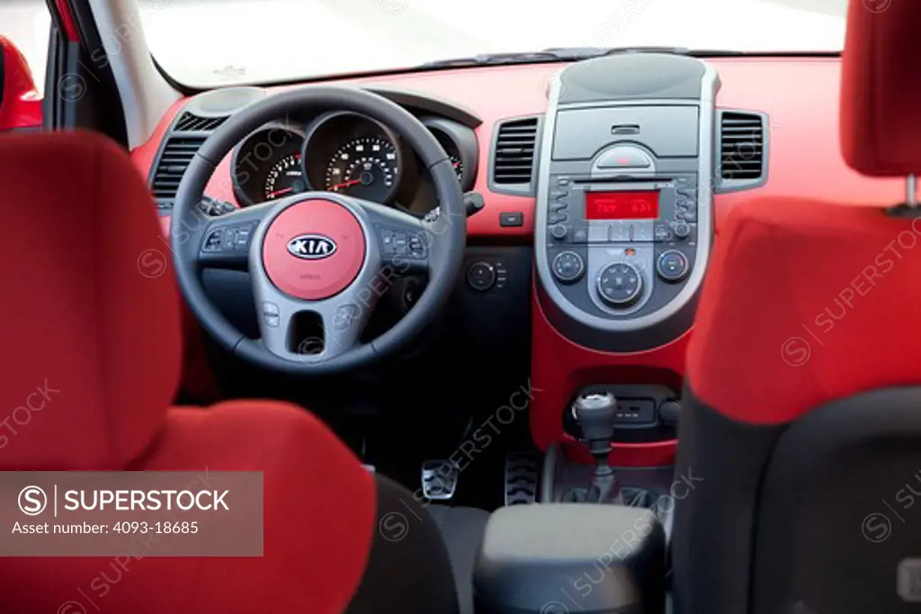 Interior view of a 2010 red Kia Soul