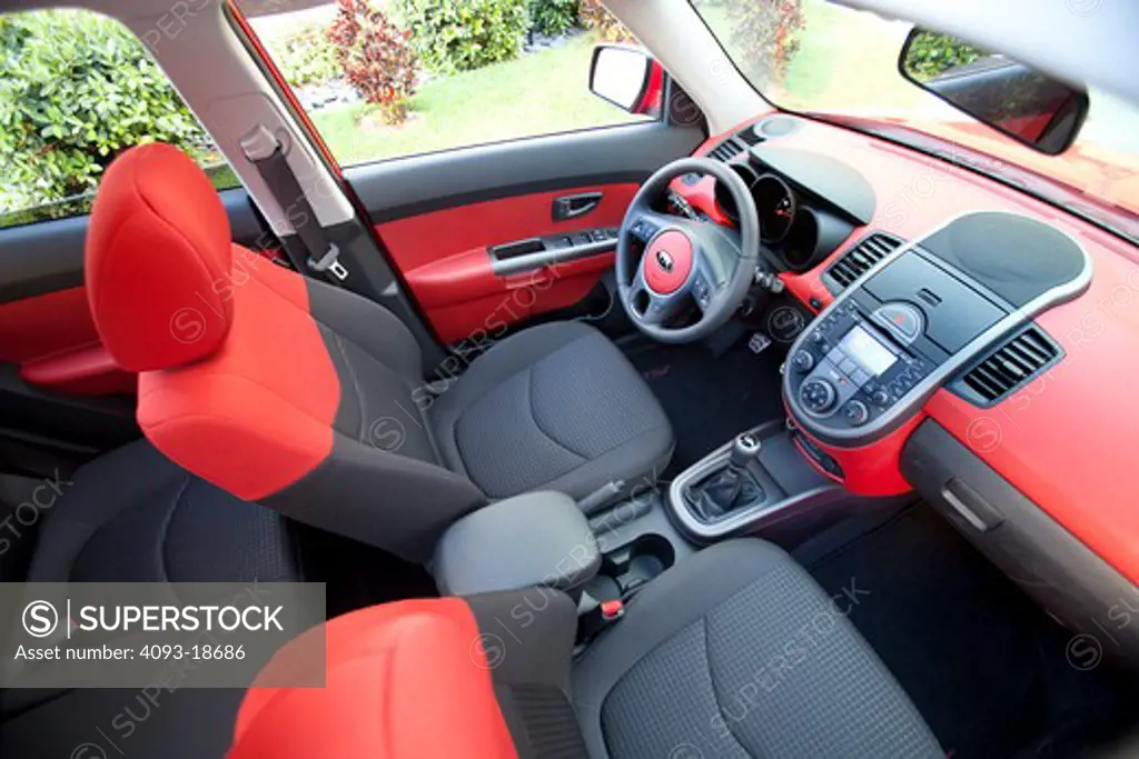 Interior view of a 2010 red Kia Soul