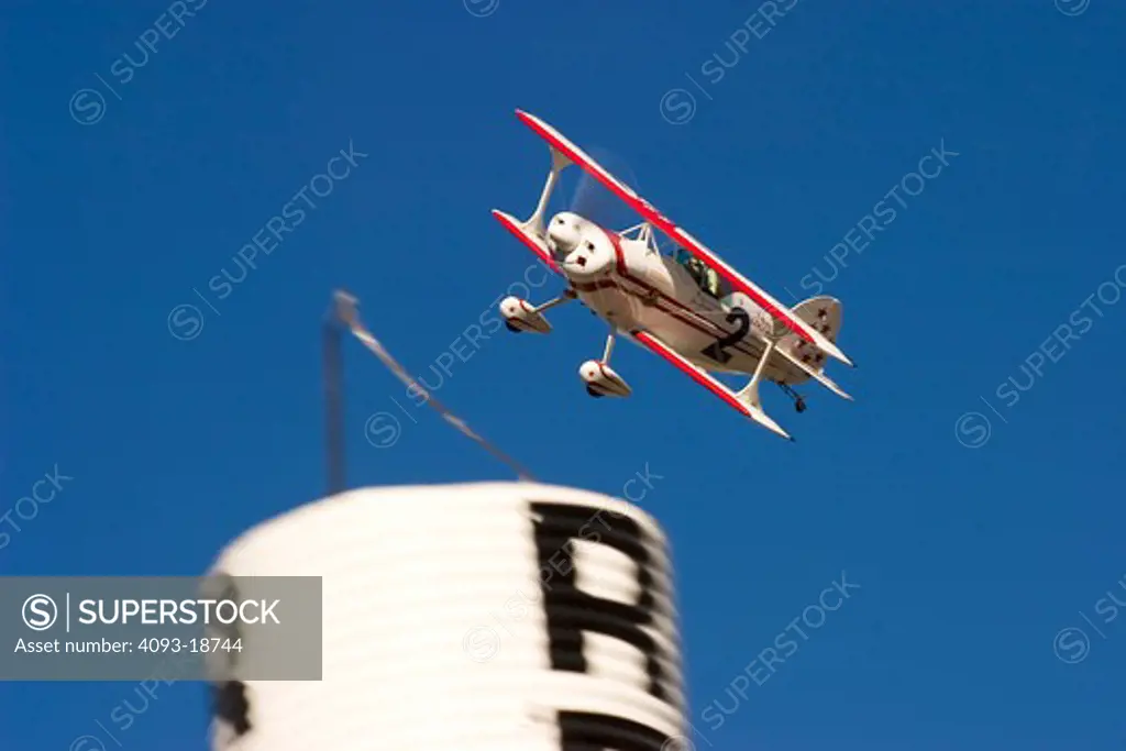 Airplane racing at the Reno Air Races, Reno Stead Airport, Reno, Nevada. In flight flying