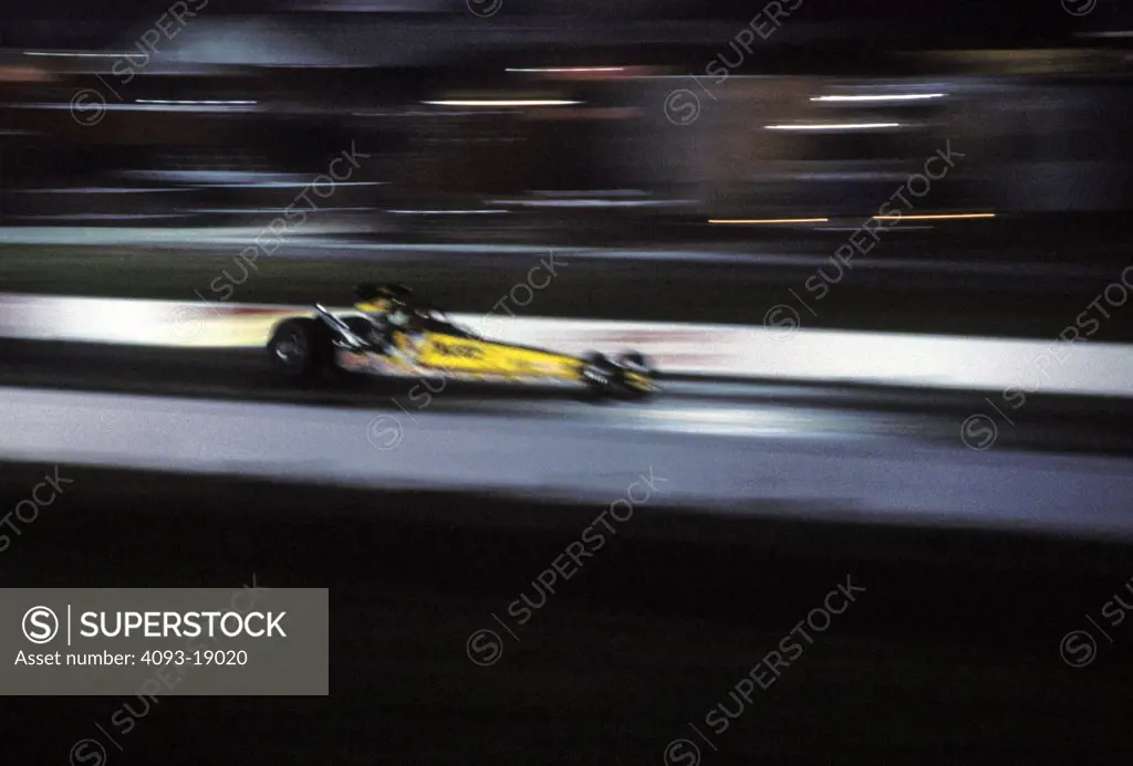 1997 NHRA Winter Nationals Ennis Texas drag racing dragster yellow profile blur race car 1990s street