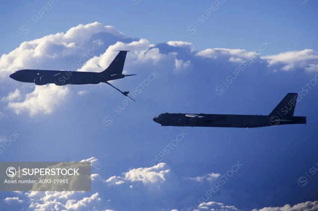 Military Jets Fixed Wing Boeing Aviat Airplanes KC-135R Stratotanker tanker in-flight refueling fuel transfer B-52H Stratofortress bomber USAF U.S. Air Force sky silhouette