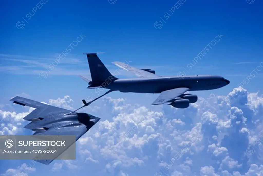 Northrop Grumman Military Jets Grumman Fixed Wing Boeing Aviat Airplanes B-2A Spirit stealth bomber KC-135R Stratotanker in-flight refueling fuel transfer tanker boom sky