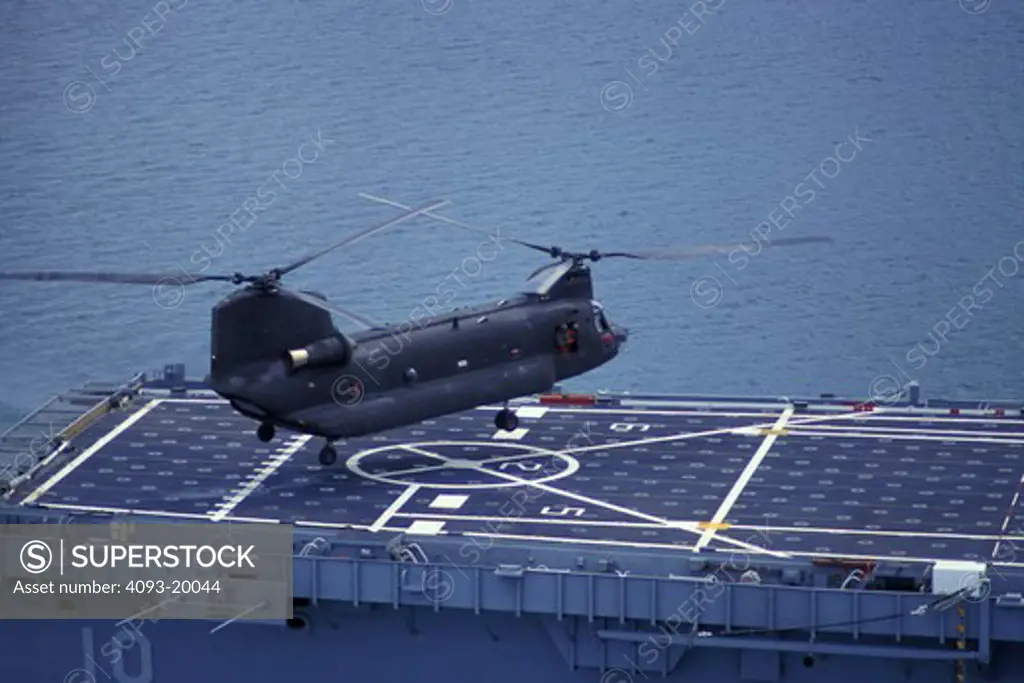 Military Helicopters Boeing Aviat CH-47D Chinook USS Juneau aircraft carrier USN U.S. Navy takeoff landing