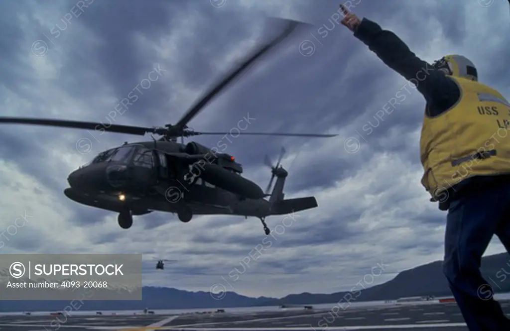 Sikorsky Military Helicopters Aviat UH-60A Black Hawk Army USS Juneau aircraft carrier USN U.S. Navy signalman