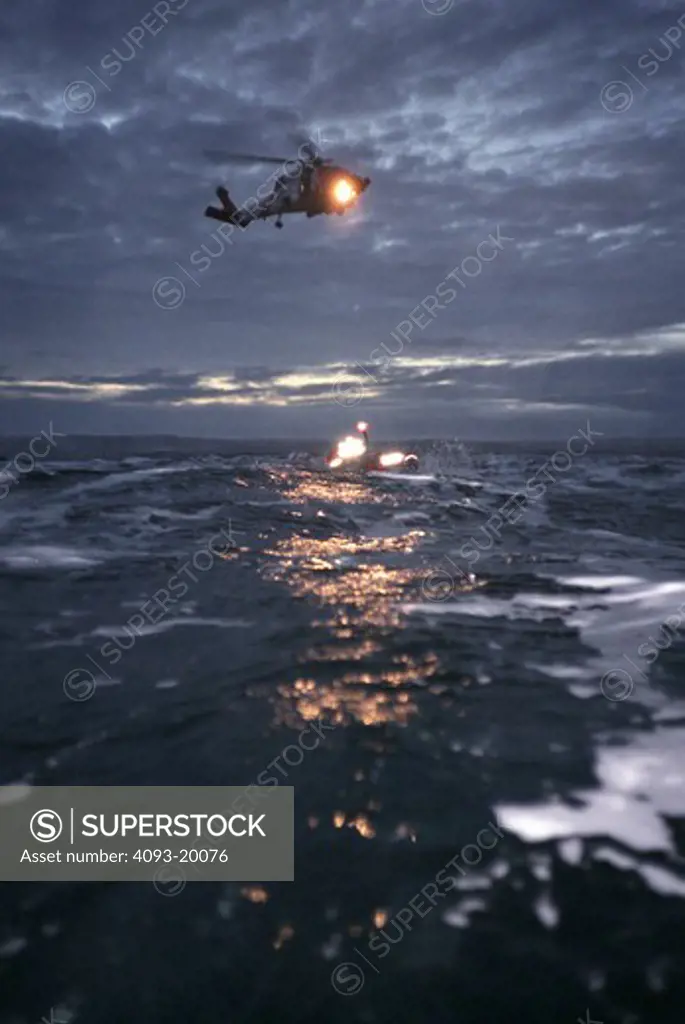 Sikorsky Military Helicopters Aviat HH-60J Jayhawk AirSta Sitka USCG U.S. Coast Guard rescue swimmer hoist