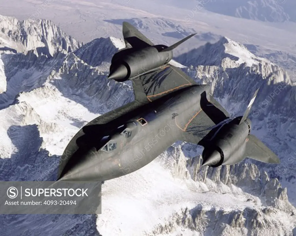 Dryden's Lockheed SR-71B  NASA 831  slices across the snowy southern Sierra Nevada Mountains of California after being refueled by an Air Force Flight Test Center tanker during a recent flight.