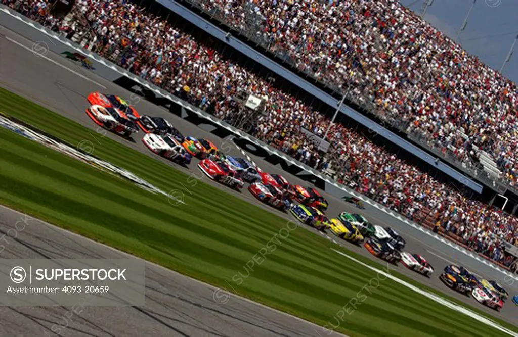 NASCAR Nextel Cup pack grandstands crowd
