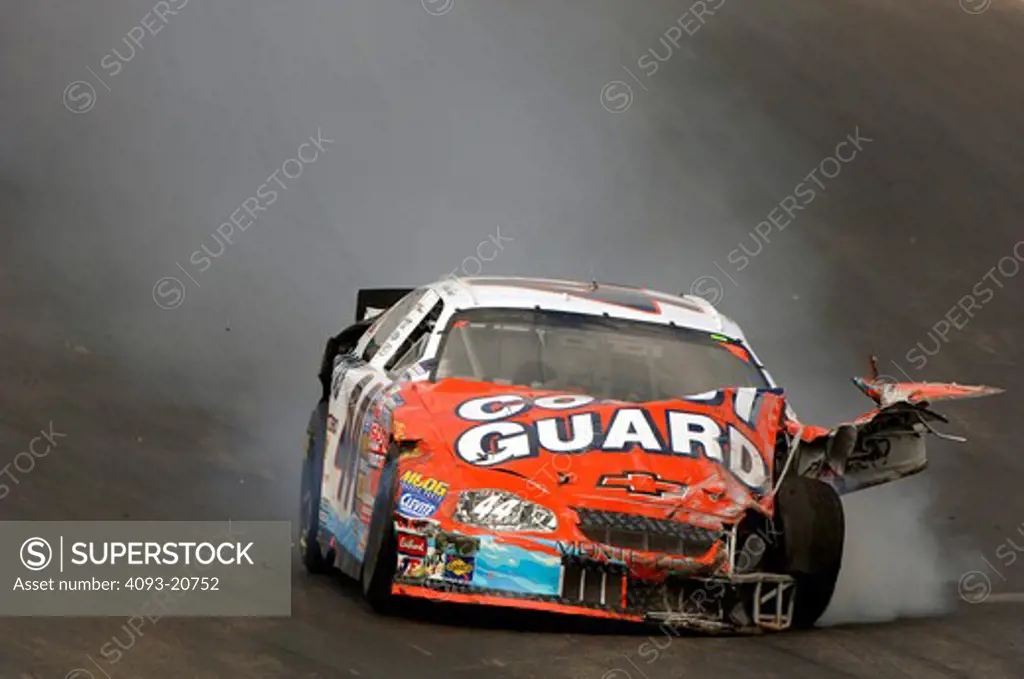 NASCAR tore smoke wreck crash damage