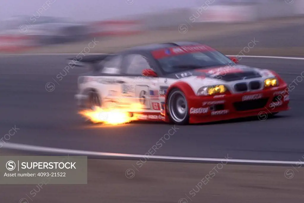 BMW sports car racing flame Laguna Seca ALMS 2000 race car street