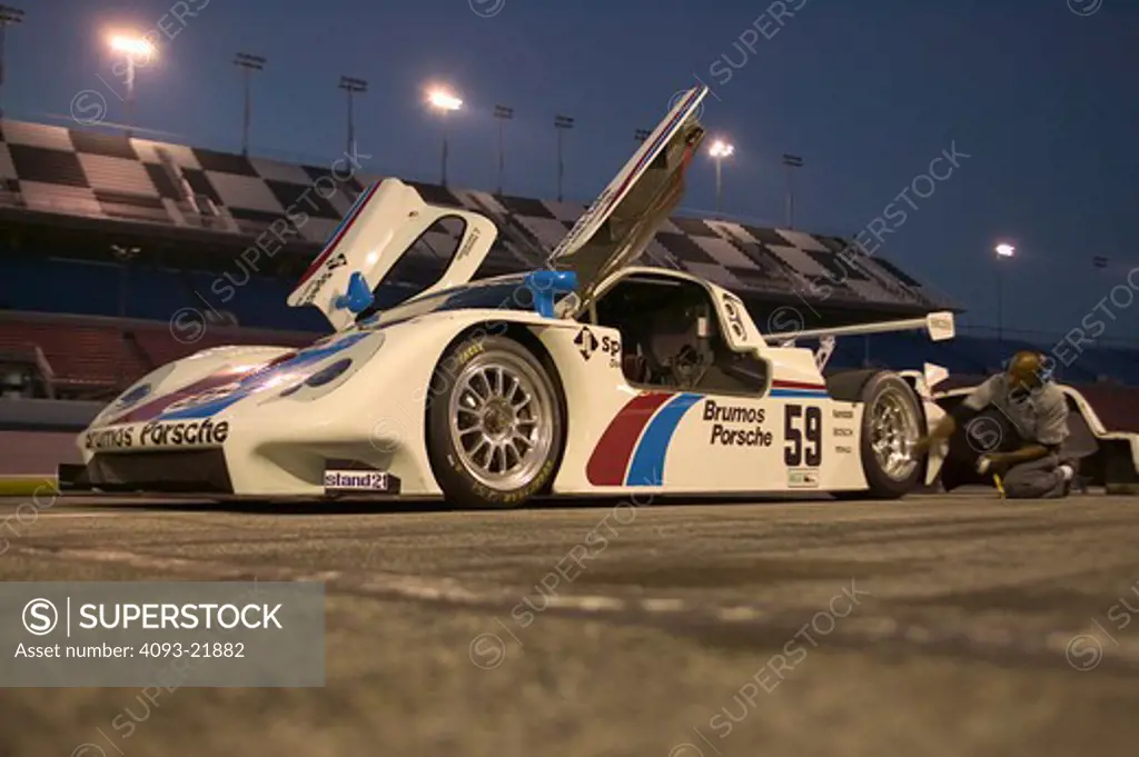 Porsche Grand American Grand-Am Cup Series Daytona Brumos race car open doors pre-race mechanic