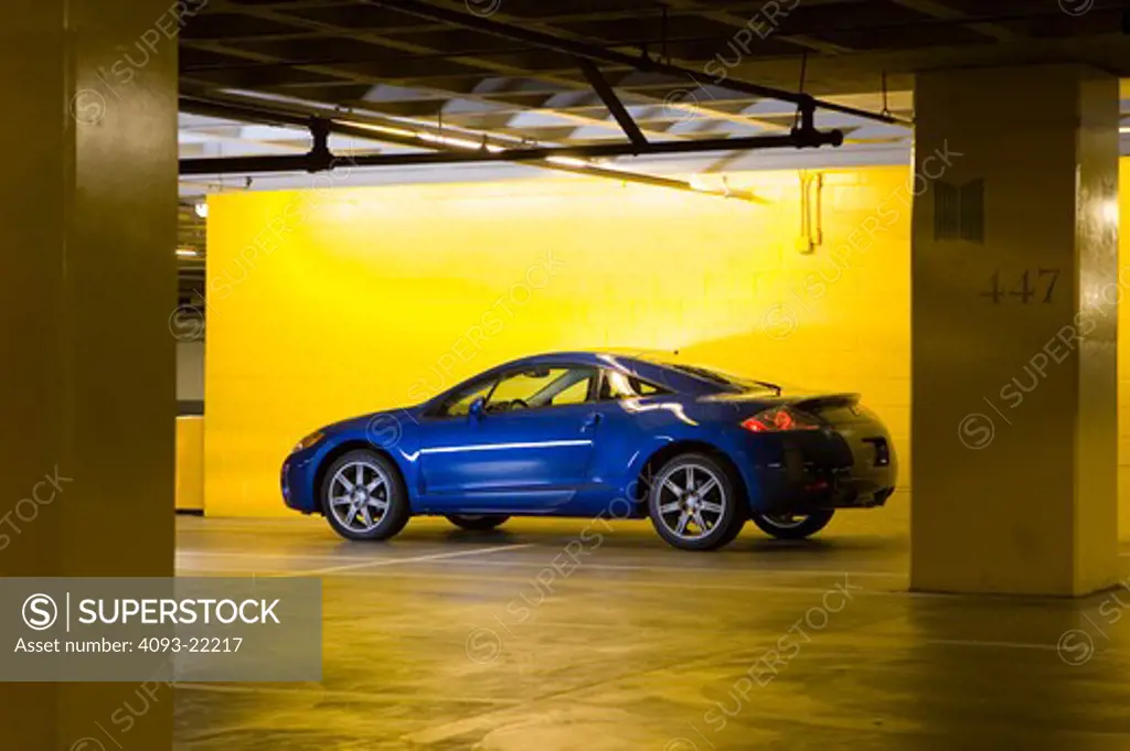 Eclipse 2006 blue parking garage yellow