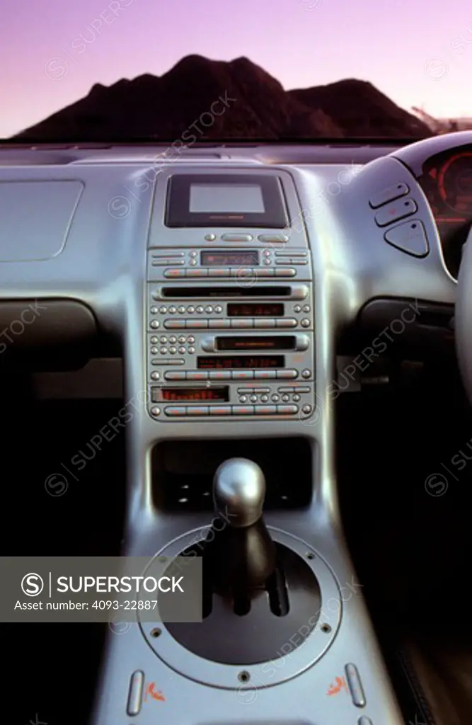 interior detail Isuzu 4200 R 1991 1990s silver dashboard gear shift buttons controls