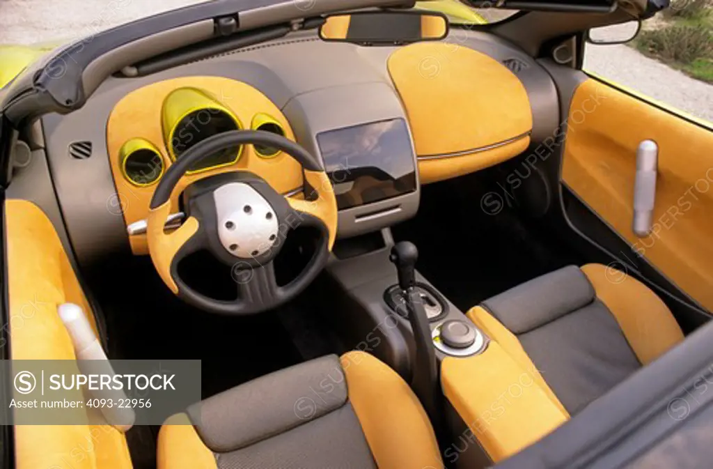 interior high angle Mitsubishi SST 1998 1990s orange grey seats steering wheel dashboard gear shift