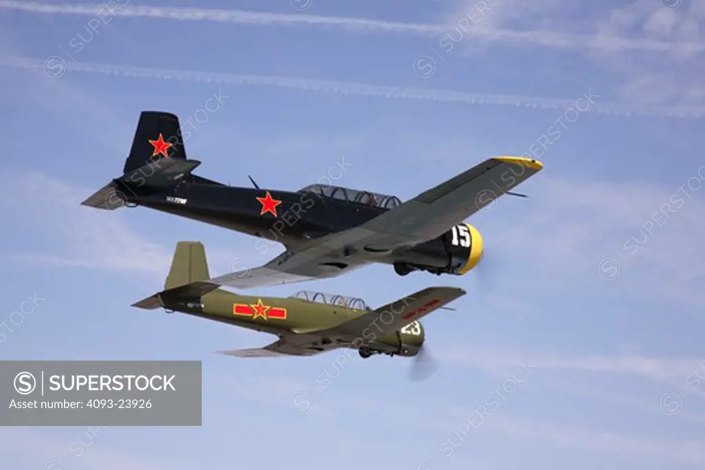 2 Chinese Nanchang CJ-6 military trainers in formation flight over Porterville, CA.