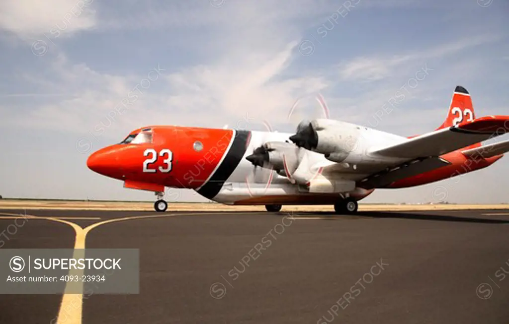 The Lockheed P-3 Orion is a maritime patrol aircraft used by numerous navies and air forces around the world. Many like this one are now used for aerial fire fighting. taxiing at Porterville, CA airport.