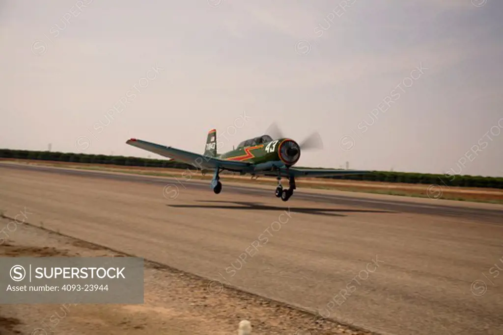 Chinese Nanchang CJ-6 military trainer landing at Porterville airport in California.