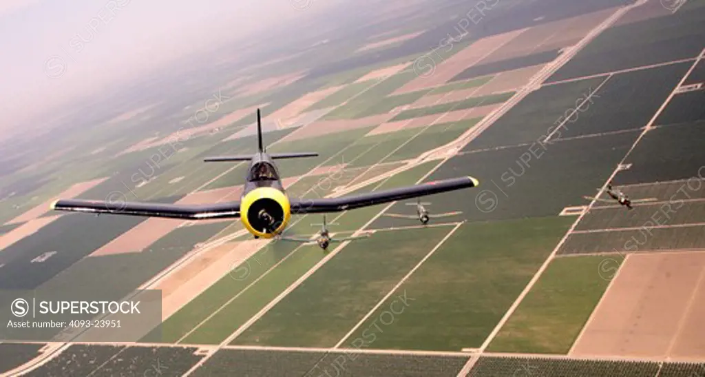 4 Chinese Nanchang CJ-6 military trainers in formation flight over Porterville, CA.
