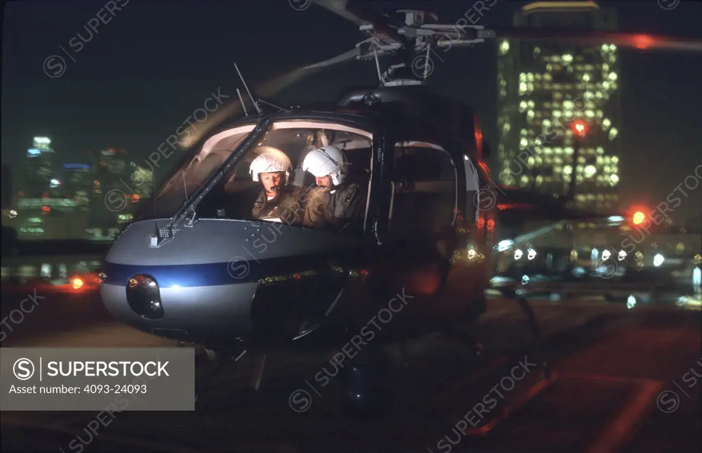 Helicopters Eurocopter Aviat AS 350 A-Star front 3/4 LAPD police rooftop helipad heliport city