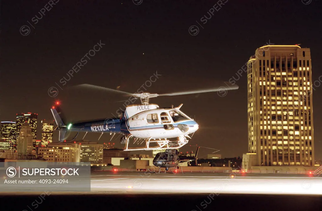 Helicopters Eurocopter Aviat AS 350 A-Star LAPD police rooftop helipad heliport city