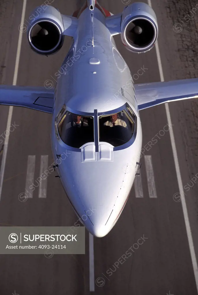 overhead detail Learjet Jets Fixed Wing Aviat Airplanes 60 charter nose runway takeoff landing