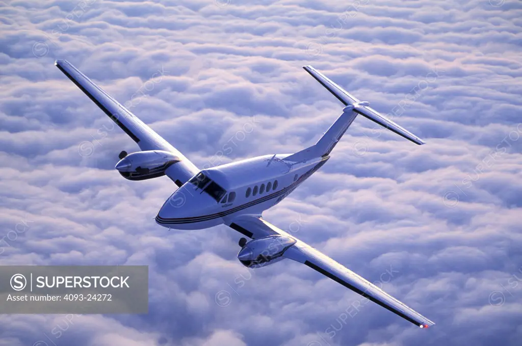 overhead Turboprop Raytheon Prop Fixed Wing Aviat Airplanes Beech B200 King Air charter sky