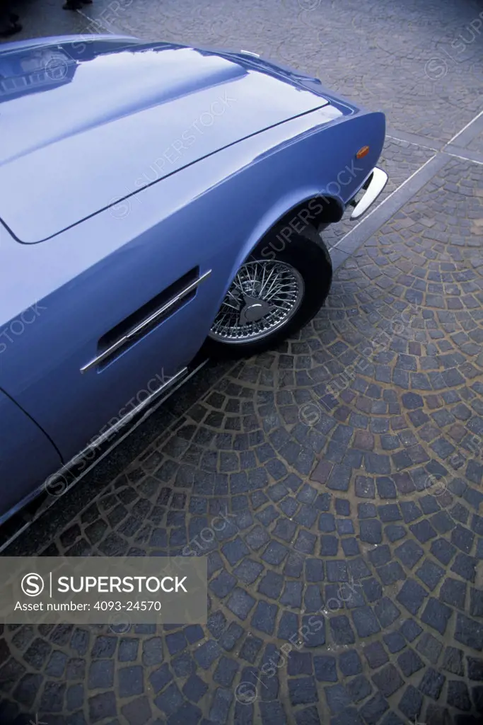 Aston Martin Vantage 1973 1970s blue flank vent hood fender wire wheel spinner