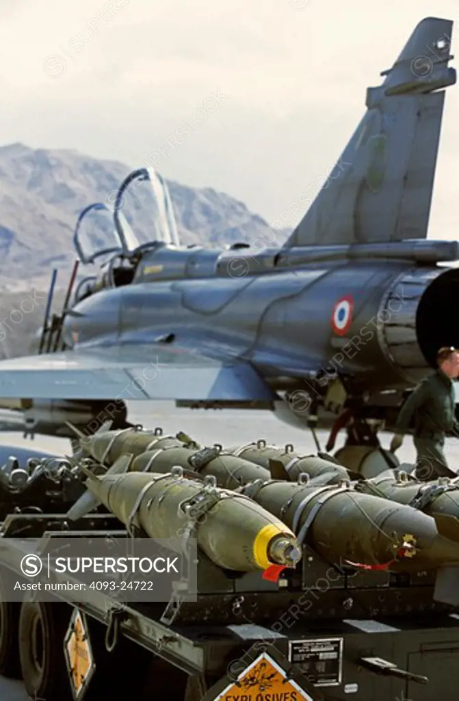 French Air Force Dassualt MFG  Mirage 2000 fighter-bomber loading 500 pound bombs/ordnance. Taking part in Red Flag exercises at Nellis Air Force Base  Las Vegas  NV.