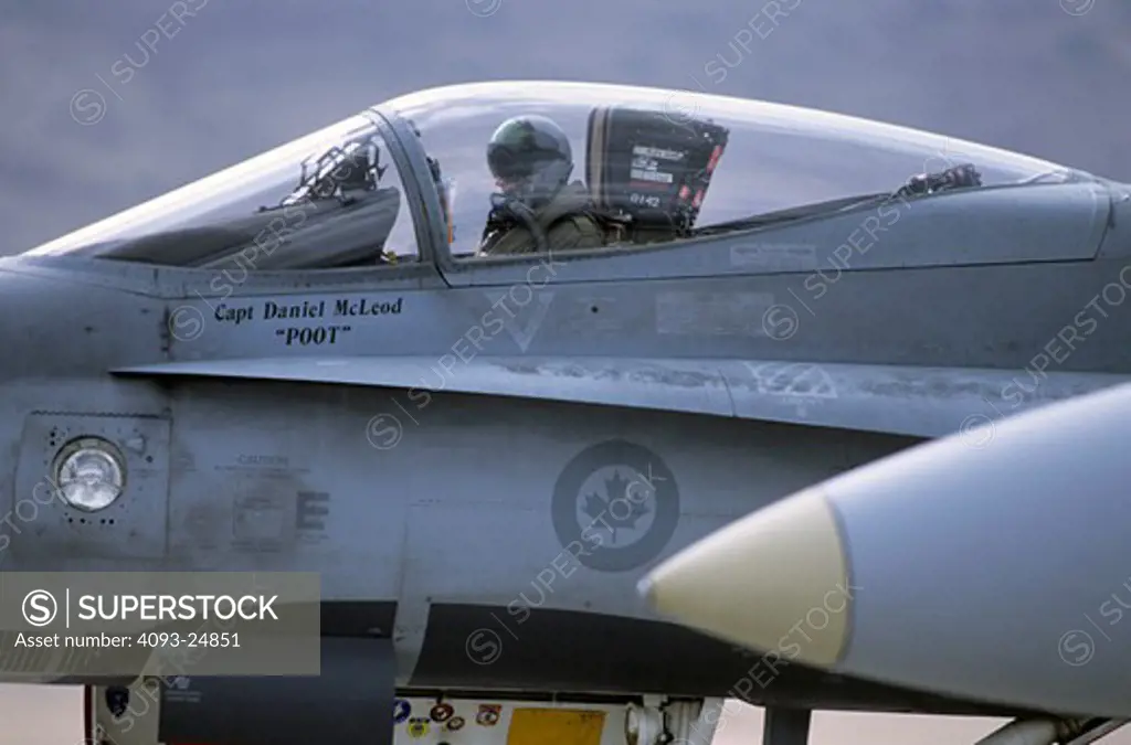 Canadian Air Force CF-18 Hornets await clearance for takeoff.