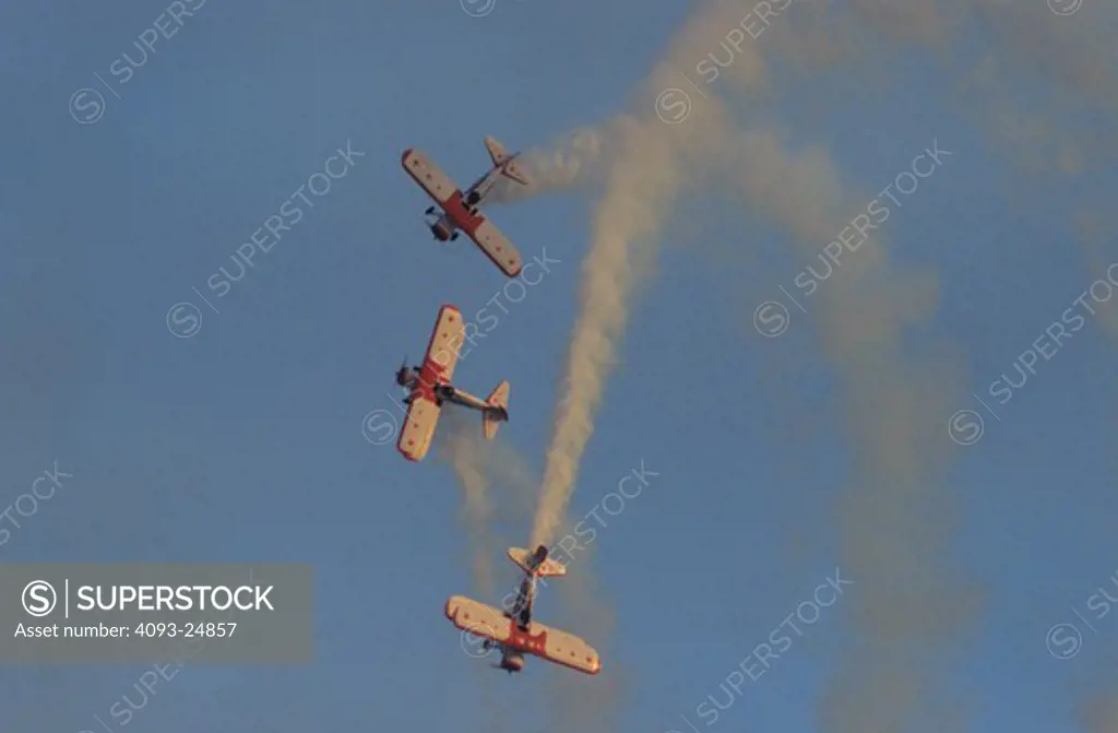Red Baron Pizza Squadron air show team flying vintage Boeing Stearman trainers.