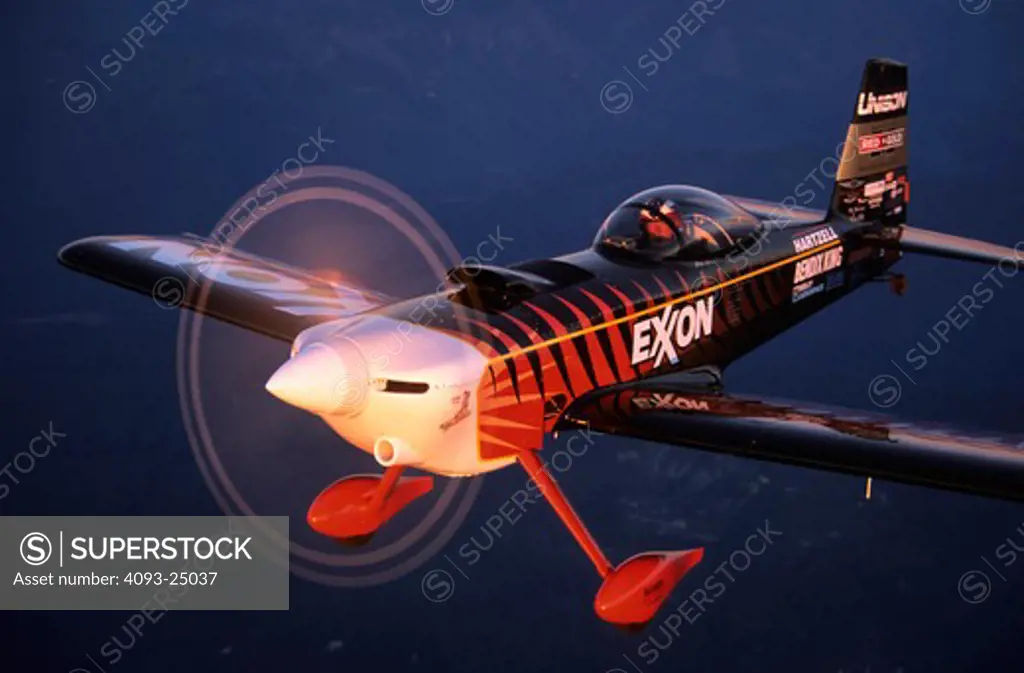 Bruce Bohannon flying his Exxon Flyin' Tiger. in which he has set more than 24 time to climb and altitude records nearing 50 000 feet altitude Air to air photos taken near Saint Augustine  FL. One of a kind airplane based on a Vans RV-4