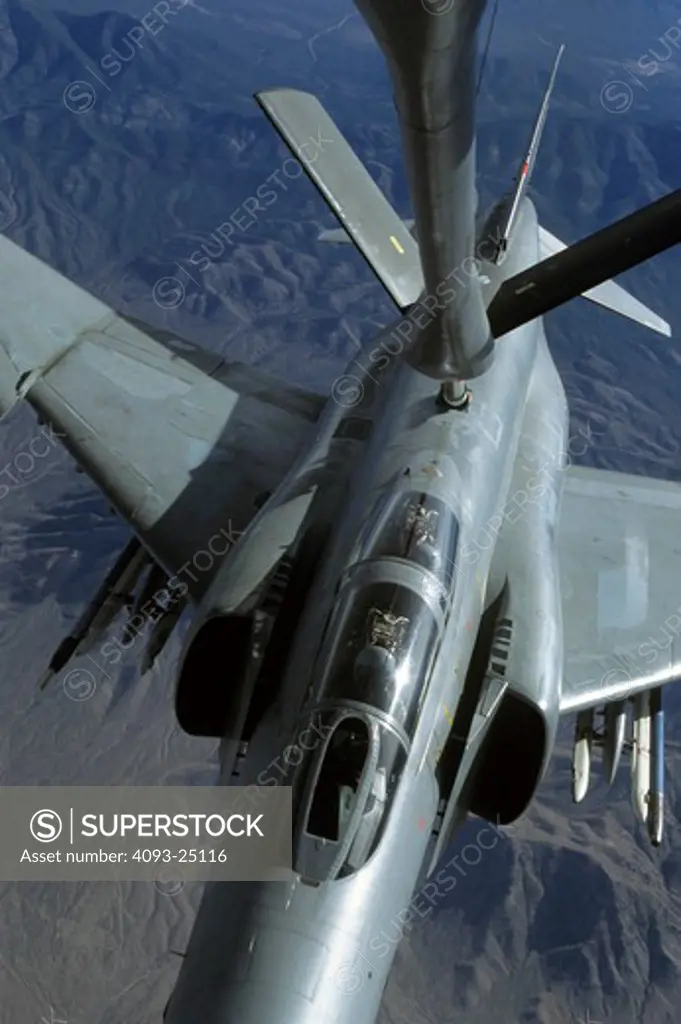 very tight close up shot of German Air Force (Luftwaffe) McDonnell F-4 Phantom II as seen from a KC-135 Stratotanker tanker boomer position, with refueling boom in image