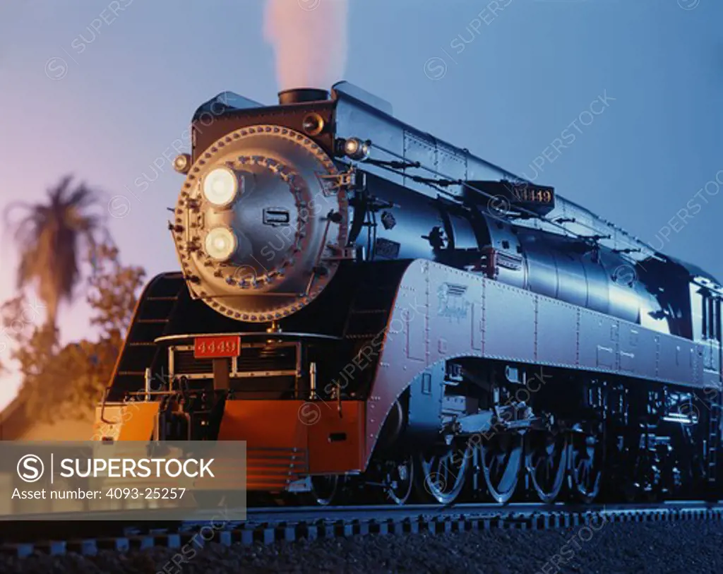 A 1:32 scale model of a Southern Pacific GS-4 steam locomotive painted in the Daylight color scheme. The GS-4s were a streamlined 4-8-4 Northern type steam locomotive that served the Southern Pacific Railroad from 1941 to 1958.  Lima Locomotive Works and were numbered 4430 through 4457. GS stands for Golden State or General Service. The GS-4s  high-speed passenger service and were used on Southern Pacific's premier passenger trains,  4449 GS-4 Model Train Trains