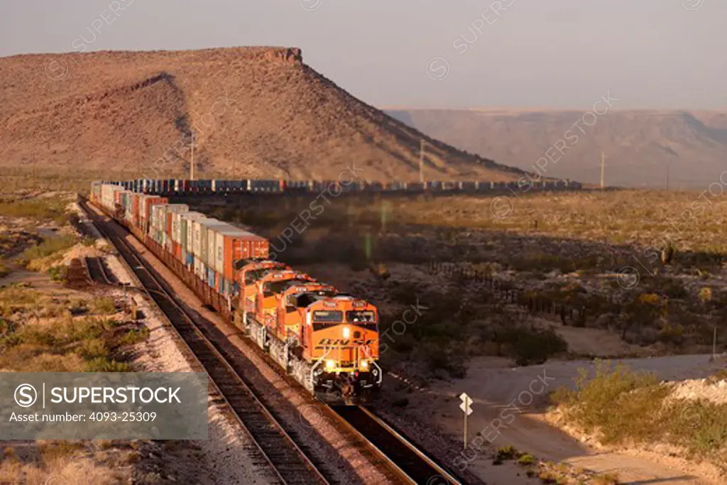 Two mile long BNSF test train with double stack cargo containers near Harris, Arizona.