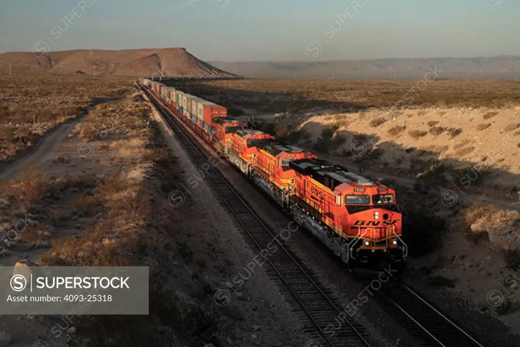 Two mile long BNSF test train with double stack cargo containers near Harris, Arizona.