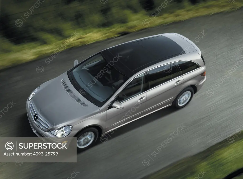 Overhead view of a silver 2006 Mercedes Benz R Class Multipurpose Vehicle driving on road.