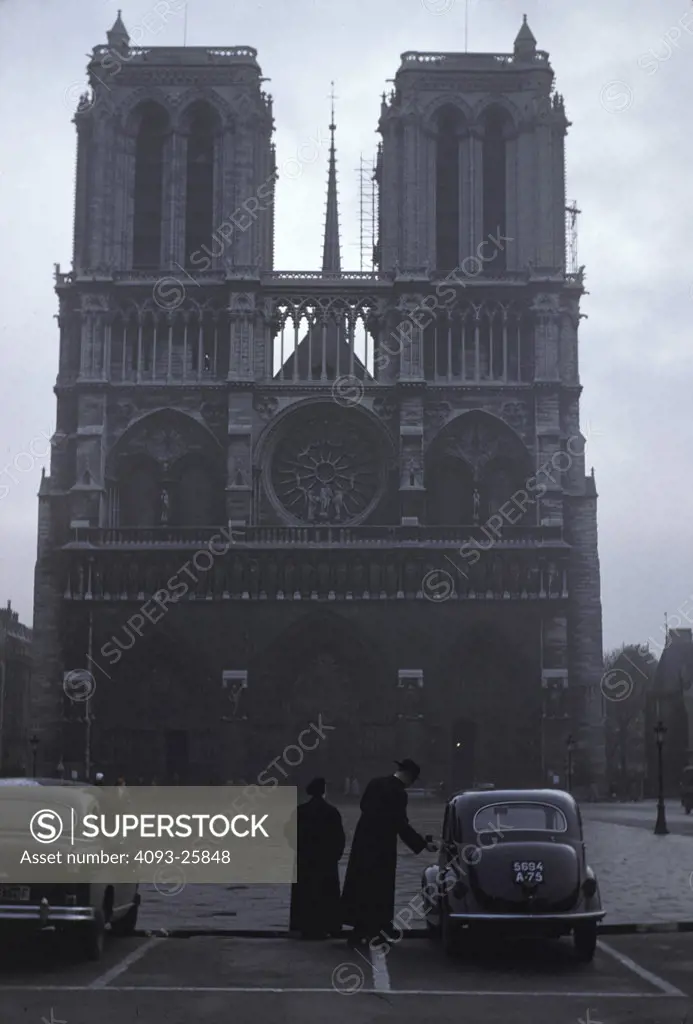 1940s black cathedral priests Paris France Notre Dame
