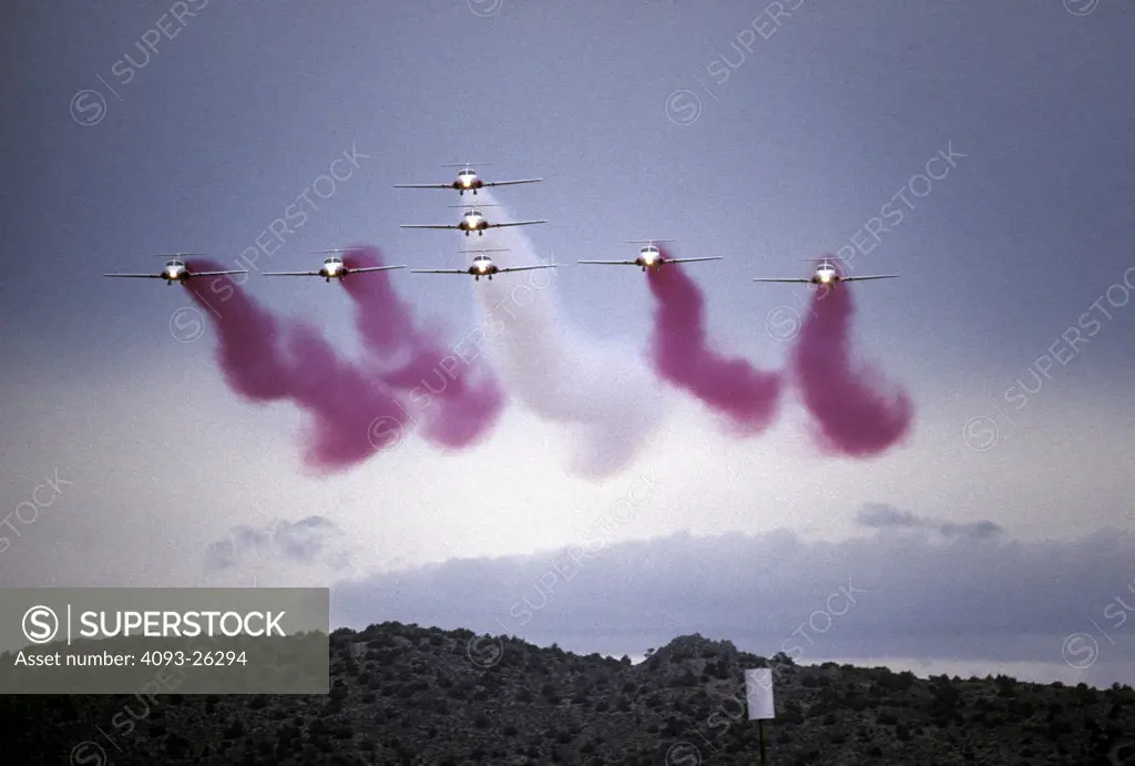 Military Jets Fixed Wing Aviat Airplanes Snowbirds flight demonstration squadron aerobatic performance flying team Royal Canadian Air Force Canadair CT-114 Tutor air show formation sky smoke head on