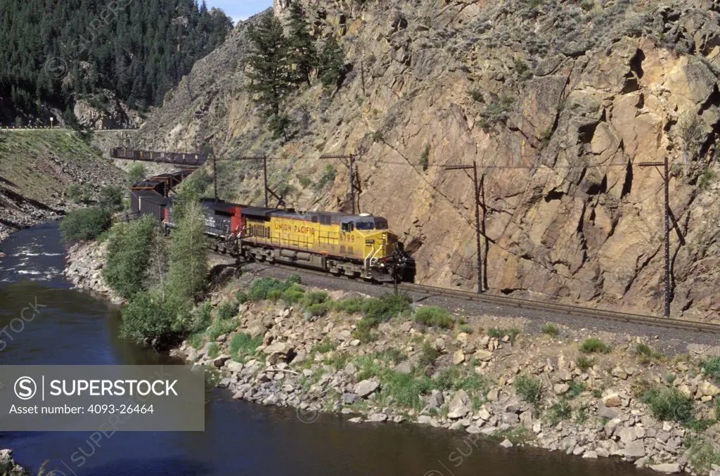 Union Pacific UP 6799 coal train curve winding Byers Canyon Colorado street