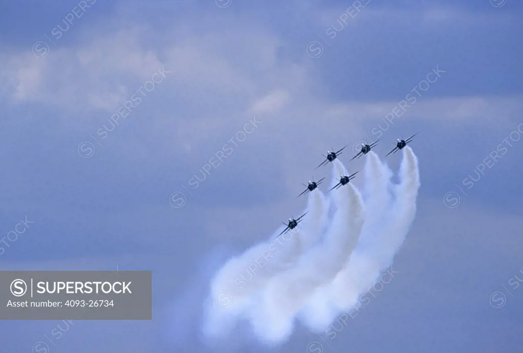 low angle Military McDonnell Douglas Jets Fixed Wing Aviat FA-18 Hornet Blue Angels Navy formation smoke