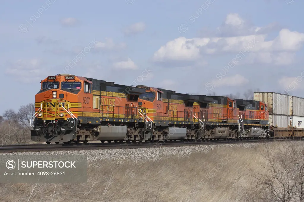 BNSF5307 Double Stack Train, General Electric Dash 9-44CW, 4 engine consist, rural setting