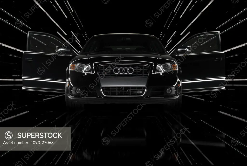 2007 Audi A 4 A-series in a black studio with long lights lighting the scene